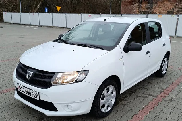 łódzkie Dacia Sandero cena 23900 przebieg: 140512, rok produkcji 2014 z Ślesin
